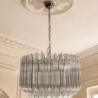 163 transparent quadrie prism chandelier hanging in living room