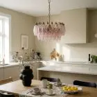 56 pink poliedri chandelier hanging in a kitchen