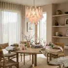 36 pink lattimo Murano chandelier hanging in a kitchen