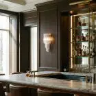 Murano wall sconces hanging in a bar
