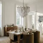 57 transparent Rondini Murano glass chandlier haning in a dinning room