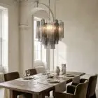 36 Murano tube chandelier hanging in a dining room