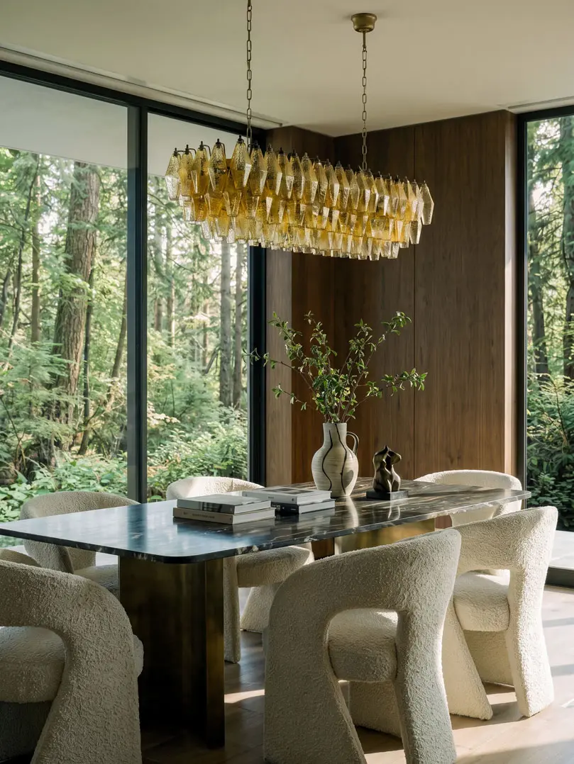 138 amber poliedri chandelier hanging in diningroom in house with a view