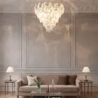 50 lattimo Murano glass leaves, hanging in a livingroom