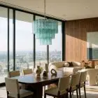 52 Murano textured turquoise chandelier hanging in a diningroom