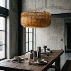 391 triedri amber prisms chandlier hanging in diningroom