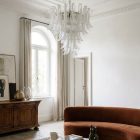 52 petals white lattimo Murano chandelier hanging in livingroom